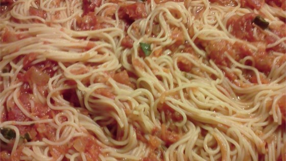 Receta de espaguetis con ajo, hierbas y tomates